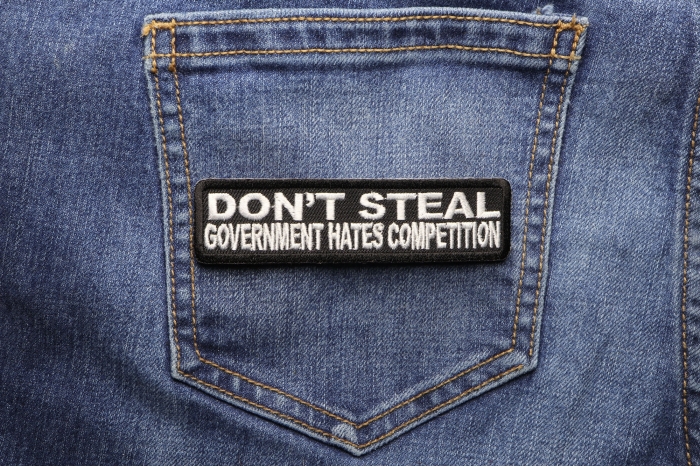 Don't Steal Government Hates Competition Funny Iron on Patch shown on jeans