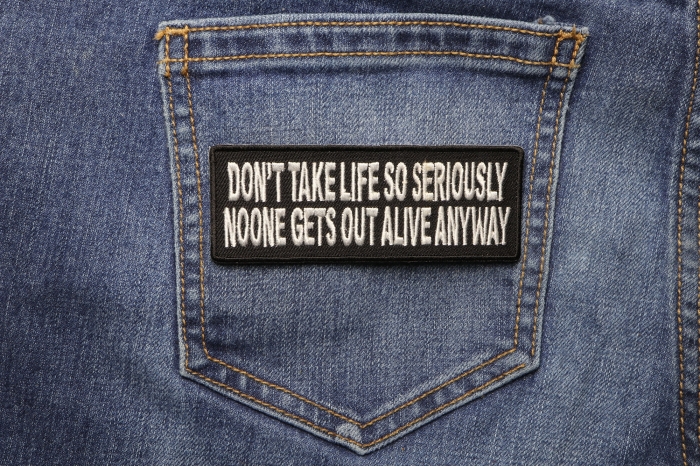 Don't Take Life So Seriously Patch shown on jeans
