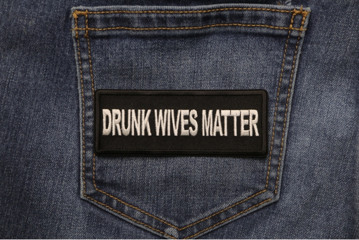 Drunk Wives Matter Patch shown on jeans