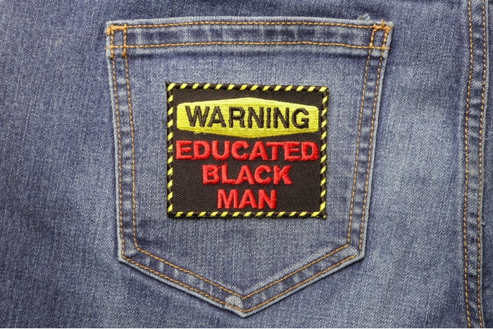 Warning Educated Black Man Funny Iron on Patch shown on jeans