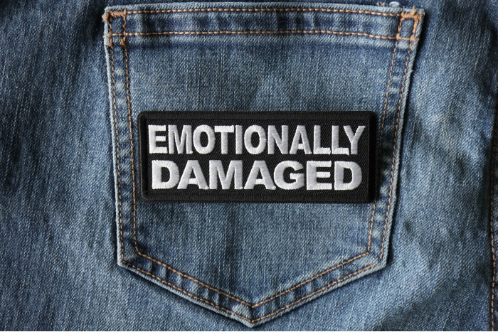Emotionally Damaged Patch shown on jeans