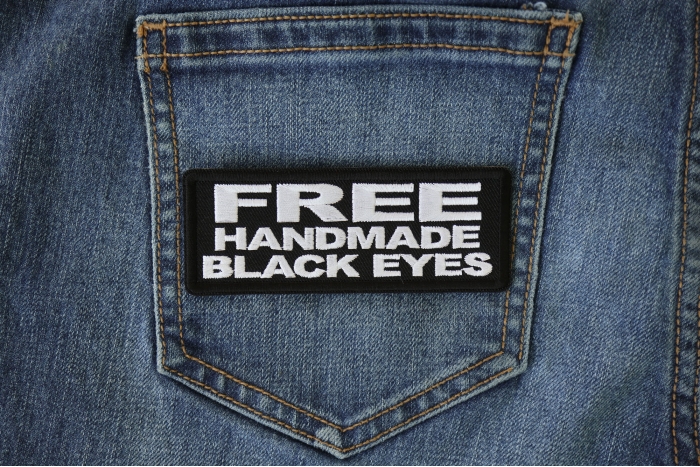 Free Handmade Black Eyes Patch shown on jeans