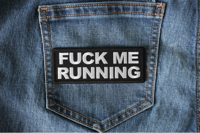 Fuck Me Running Funny Iron on Patch shown on jeans