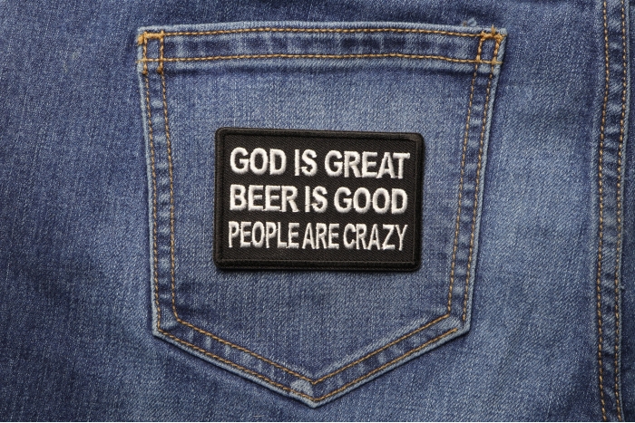 God is Great Beer is Good People Are Crazy Funny Iron on Patch shown on jeans