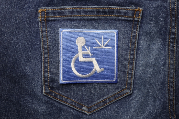 Handicap Stoner With Bong Iron on Funny Iron on Patch shown on jeans