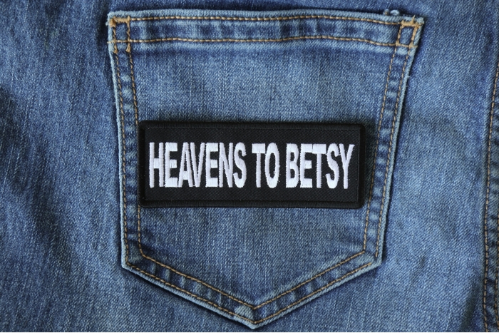 Heavens to Betsy Funny Iron on Patch shown on jeans