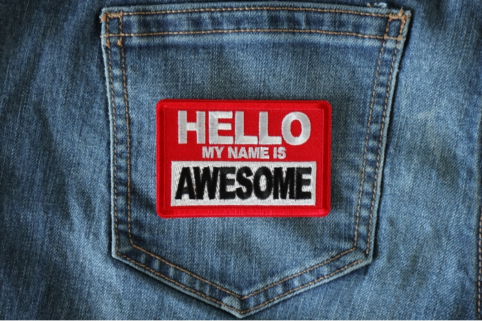 Hello My Name is Awesome Funny Iron on Patch shown on jeans