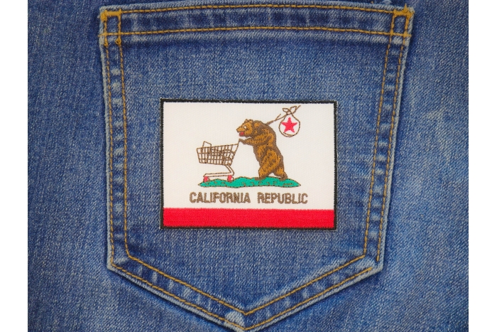Homeless California Flag Patch shown on jeans