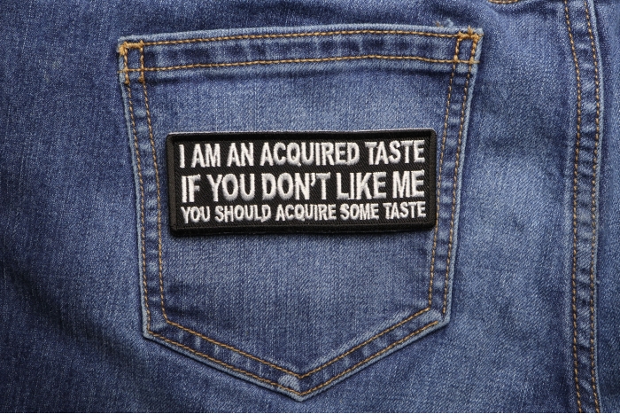 I am an Acquired Taste If You don't Like Me You Should Acquire Some Taste Funny Iron on Patch shown on jeans
