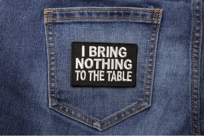 I Bring Nothing To The Table Patch shown on jeans