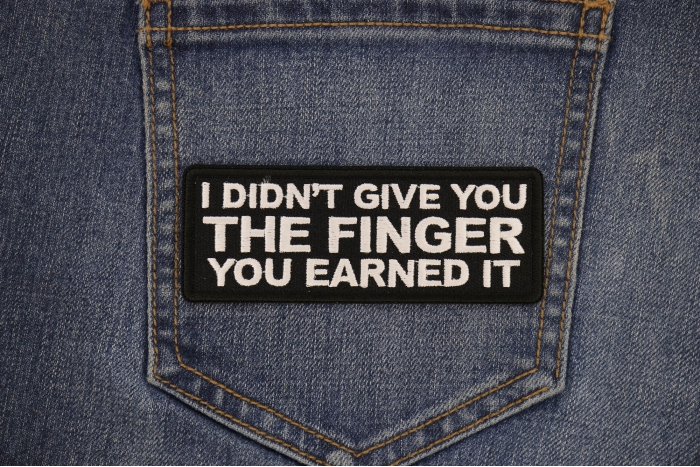 I didn't Give you the Finger You Earned it Patch shown on jeans