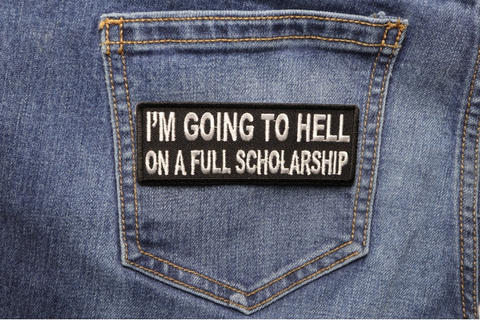 I'm Going To Hell On A Full Scholarship Funny Iron on Patch shown on jeans