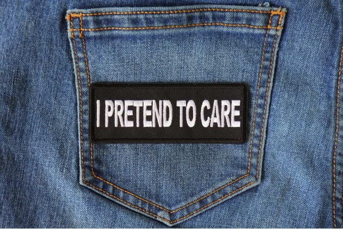 I Pretend to Care Funny Iron on Patch shown on jeans