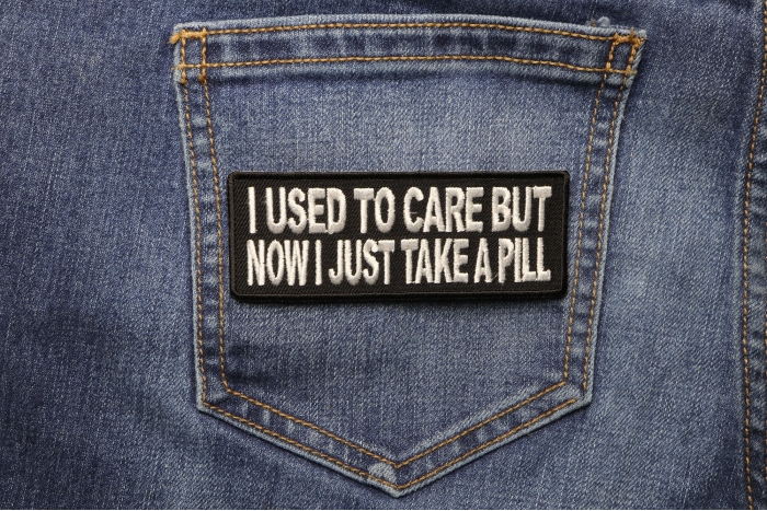 I Used To Care But Now I Take A Pill Funny Iron on Patch shown on jeans