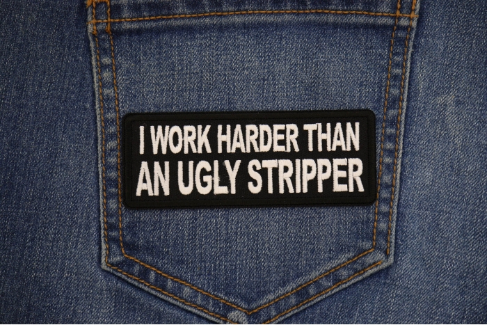 I Work Harder than an Ugly Stripper Patch shown on jeans