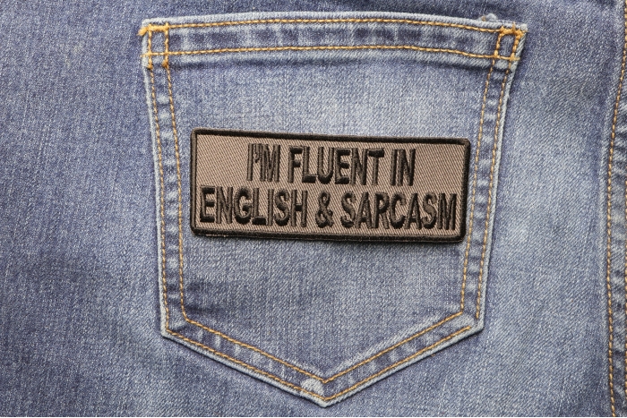 I'm Fluent In English and Sarcasm Funny Iron on Patch shown on jeans