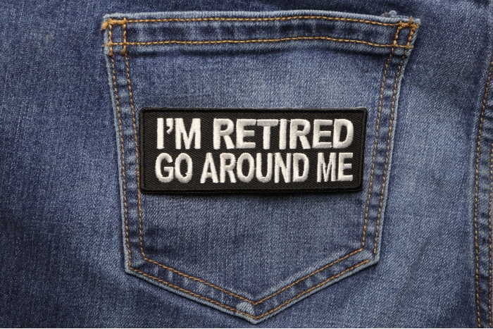 I'm Retired Go Around Me Funny Iron on Patch shown on jeans