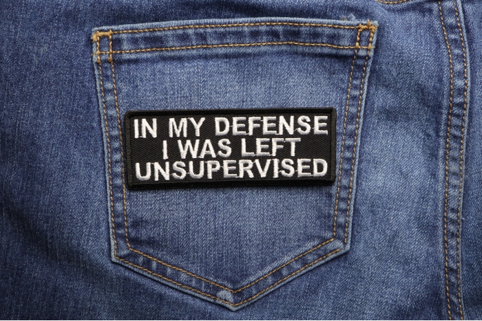 In My Defense I Was Left Unsupervised Funny Iron on Patch shown on jeans