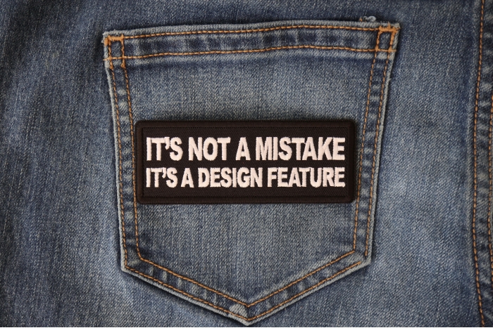 It's Not a Mistake It's a Design Feature Funny Iron on Patch shown on jeans
