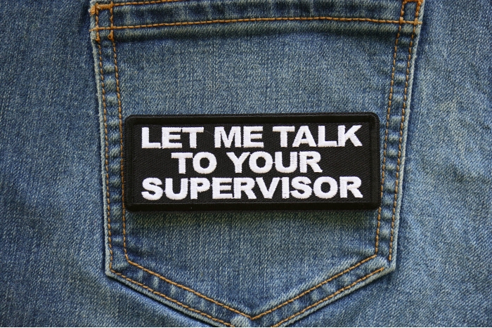 Let me Talk to your Supervisor Patch shown on jeans