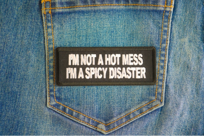 I'm Not A Hot Mess Im A Spicy Disaster Patch shown on jeans