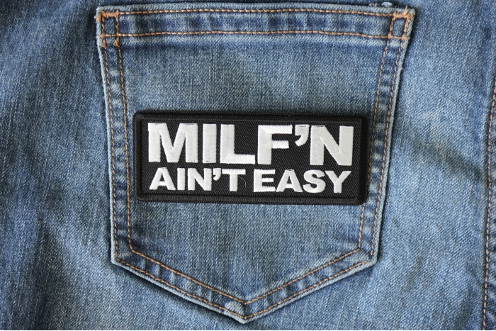 Milf'n ain't easy funny patch shown on jeans