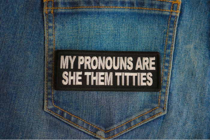 My Pronouns Are She Them Titties Patch shown on jeans