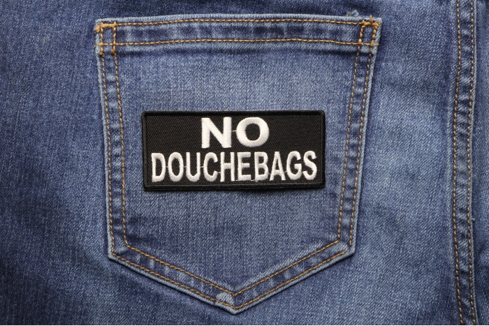 No Douchebags Patch shown on jeans