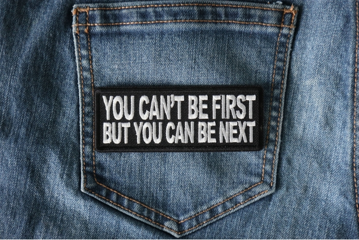 No You Can't Be First But You can be Next Patch shown on jeans