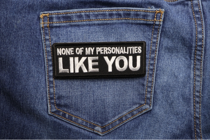 None of My Personalities Like You Funny Iron on Patch shown on jeans