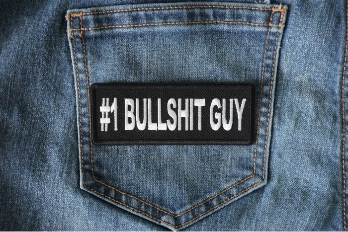 Number 1 Bullshit Guy Patch shown on jeans