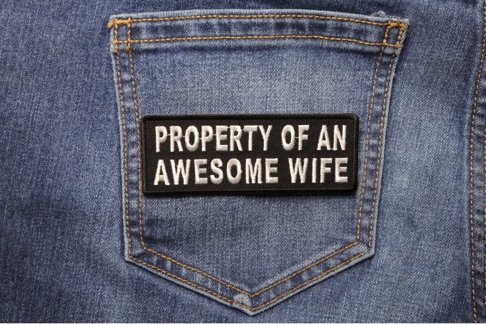 Property Of An Awesome Wife Funny Iron on Patch shown on jeans