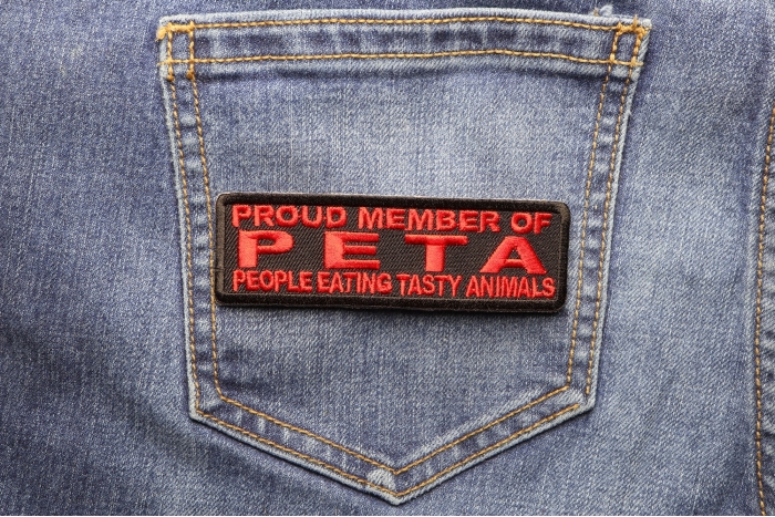 Proud Member Of Peta Funny Iron on Patch shown on jeans