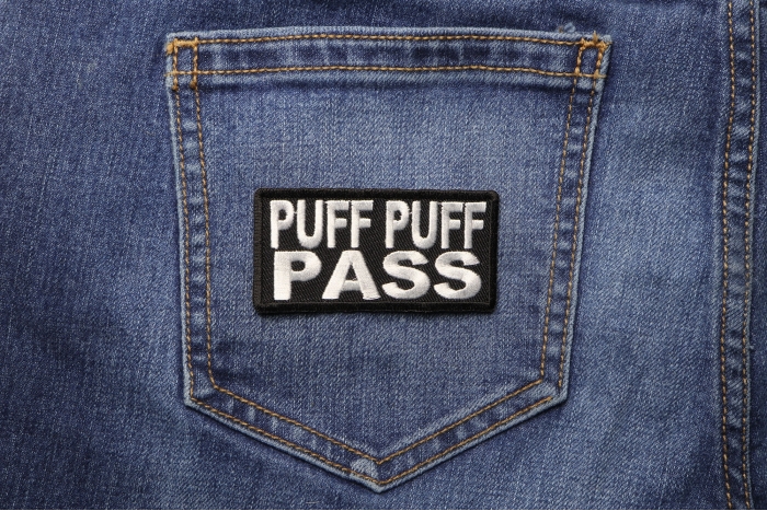 Puff Puff Pass Funny Iron on Patch shown on jeans
