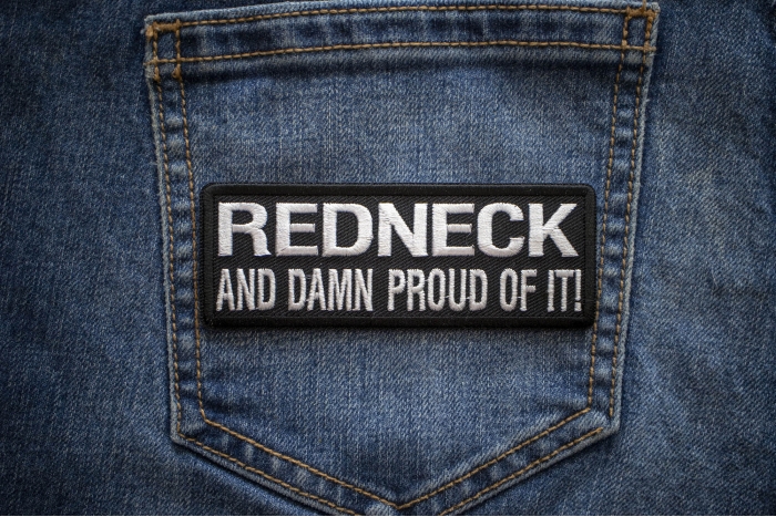 Redneck and Damn Proud Of It! Funny Iron on Patch shown on jeans