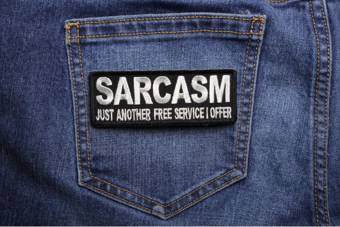 Sarcasm Just Another Service I Offer Funny Iron on Patch shown on jeans