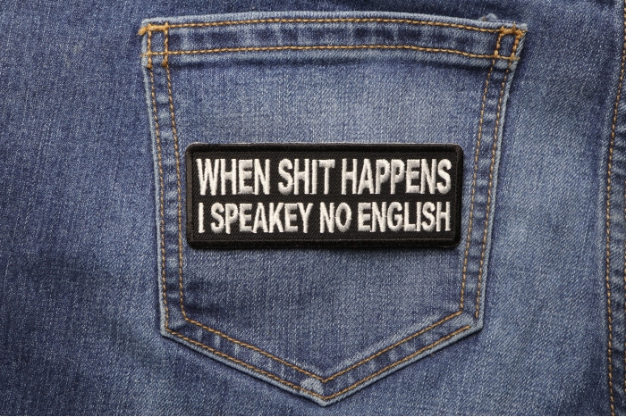 When Shit Happens I Speak No English Funny Iron on Patch shown on jeans