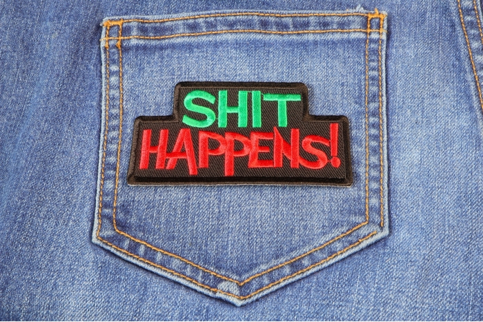 Shit Happens Patch shown on jeans