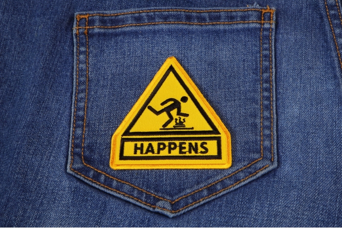 Shit Happens Patch shown on jeans