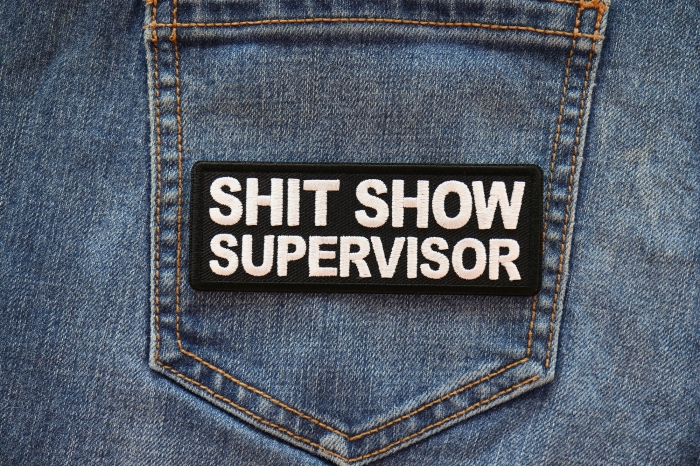 Shit Show Supervisor Patch shown on jeans