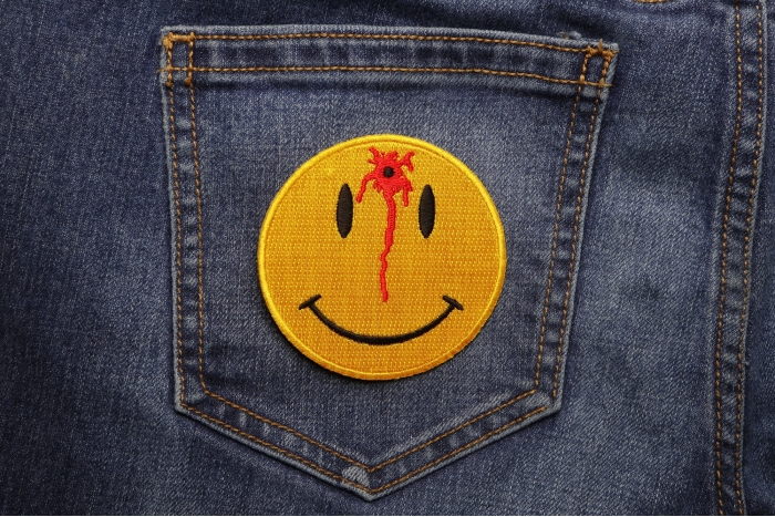 Shot Smiley Funny Iron on Patch shown on jeans