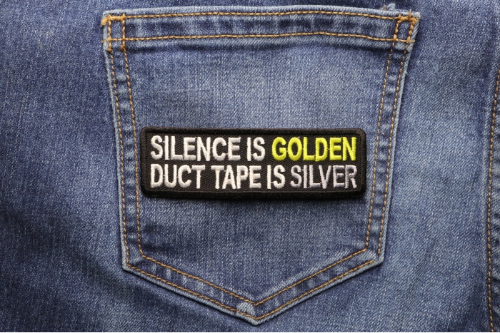 Silence Is Golden Duct Tape Is Silver Funny Iron on Patch shown on jeans