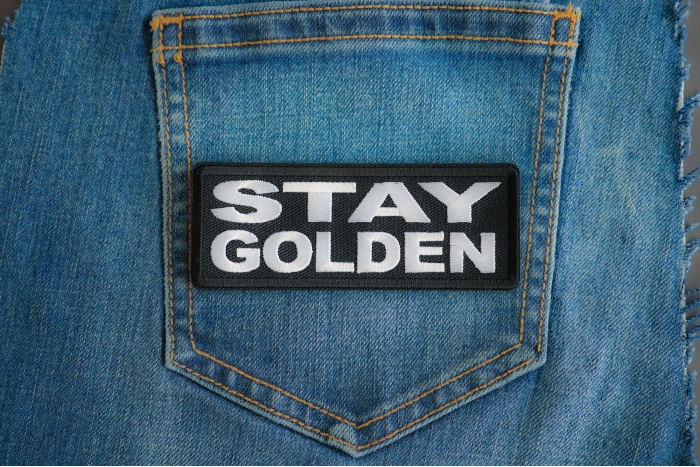Stay Golden Patch shown on jeans