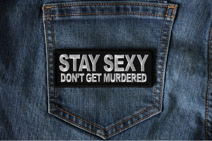 Stay Sexy Don't Get Murdered Iron on Funny Iron on Patch shown on jeans