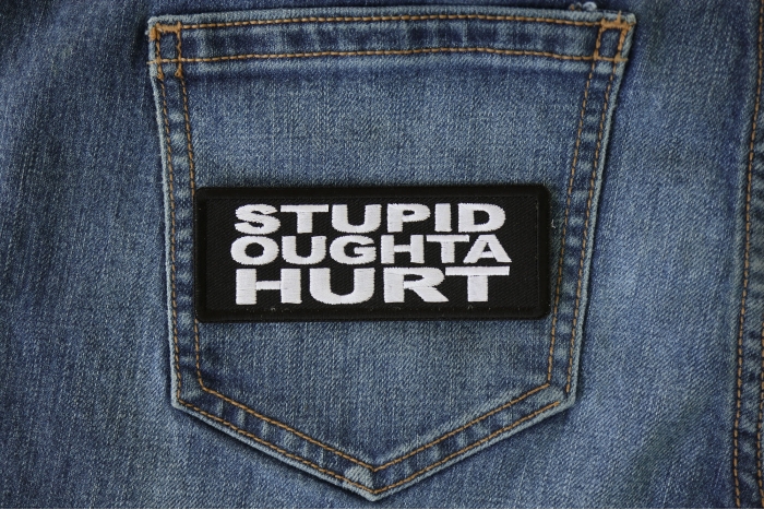 Stupid Oughta Hurt Funny Iron on Patch shown on jeans