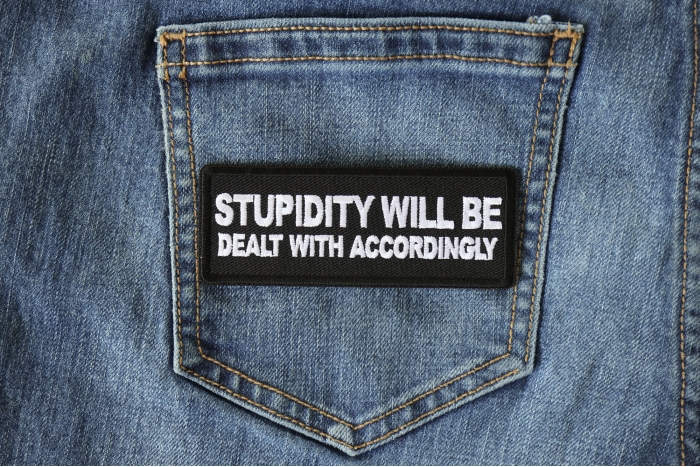 Stupidity will be Dealt with Accordingly Funny Iron on Patch shown on jeans