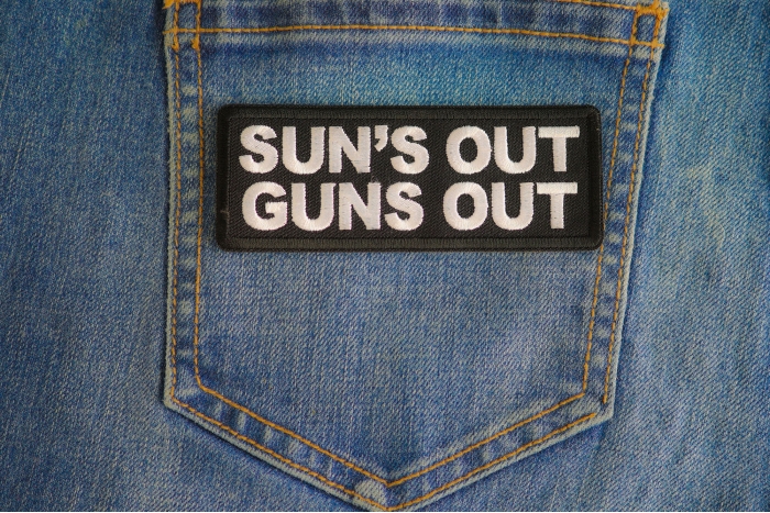Sun's Out Guns Out Patch shown on jeans