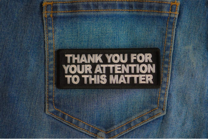 Thank You For Your Attention To This Matter Patch shown on jeans