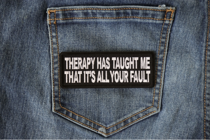 Therapy Has Taught Me That It's All Your Fault Funny Iron on Patch shown on jeans