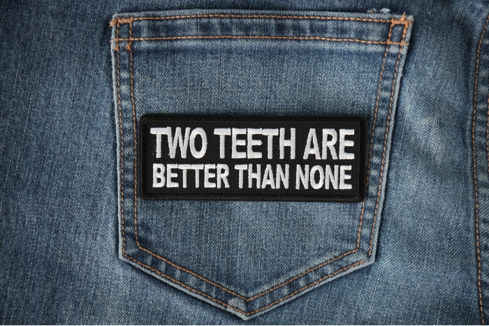 Two teeth are better than none Patch shown on jeans